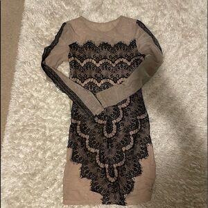 Black lace and nude long sleeve dress